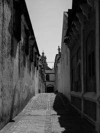 Empty walkway leading to building