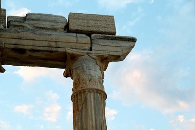 Low angle view of statue against sky