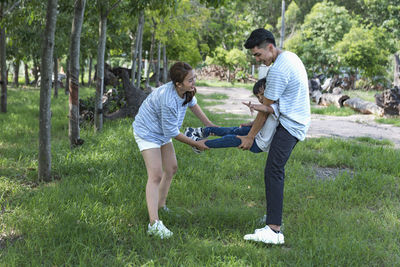 Side view of man working at park