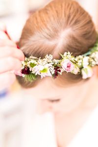 Close-up of woman holding flowers