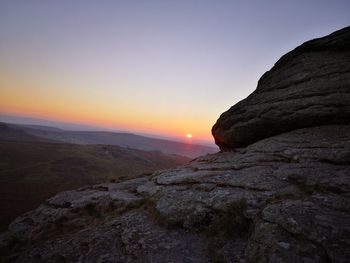 Scenic view of mountains against sky during sunset