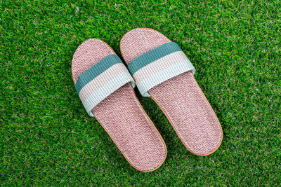 High angle view of shoes on grass