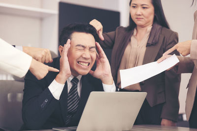 Business colleagues working at office