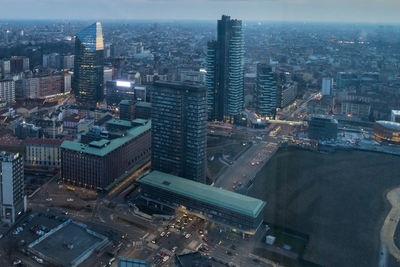 High angle view of illuminated modern buildings in city