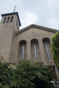 Low angle view of historic building against sky