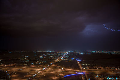 Illuminated cityscape at night