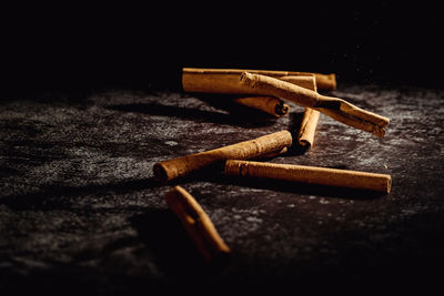 Close-up of rusty metal on table