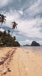 Scenic view of beach against sky