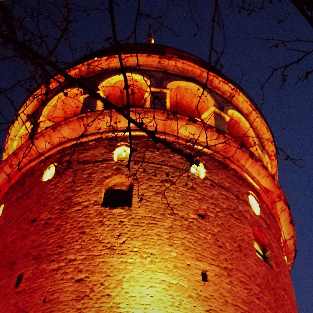 illuminated, low angle view, lighting equipment, no people, outdoors, sky, architecture, night