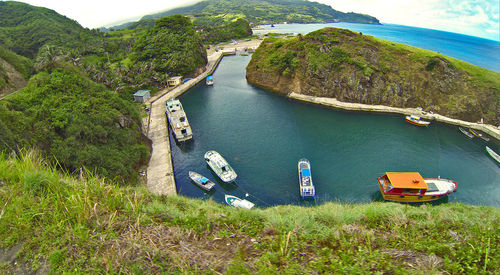 Scenic view of sea with mountains in background