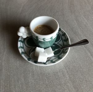 High angle view of coffee cup on table