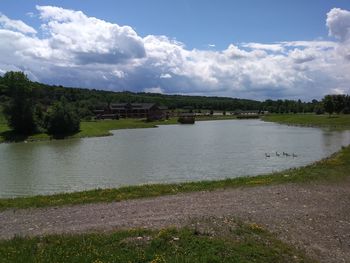 Scenic view of river against sky