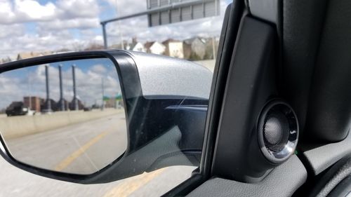 Close-up of car side-view mirror