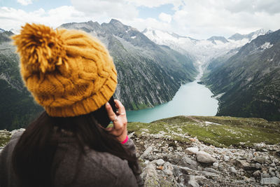 Woman looking at mountains in winter