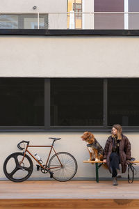 Side view of man riding bicycles