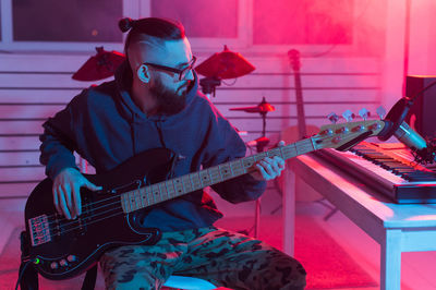 Young man playing guitar