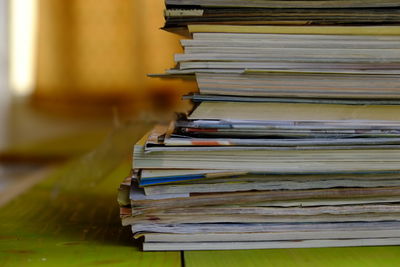 Stacked books on table