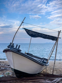 Boat in sea against sky