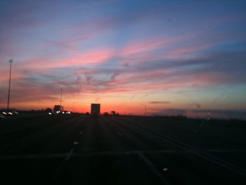 Empty road at sunset