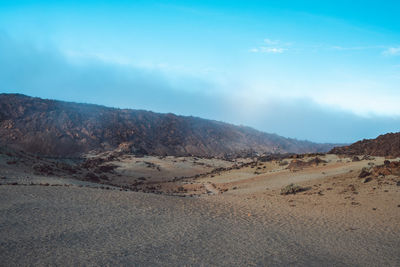 Scenic view of desert against sky