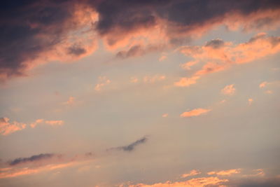 Low angle view of dramatic sky during sunset