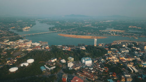 High angle view of buildings in city against sky