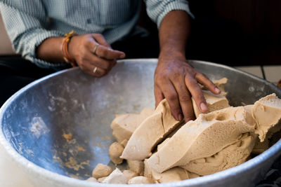 Close-up of person preparing food