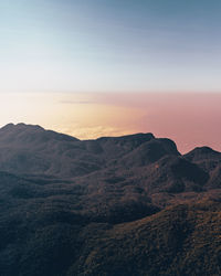 Scenic view of mountains against sky during sunset