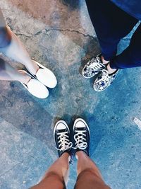 Low section of people standing on ground