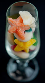 Close-up of ice cream on glass table