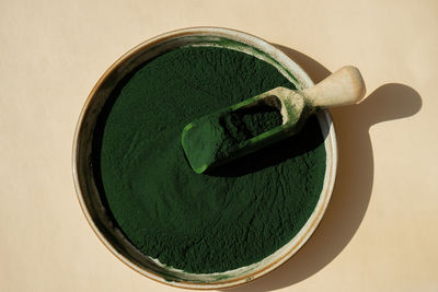 High angle view of green peas on table