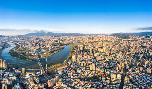 High angle view of river amidst buildings in city