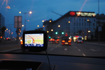 Automotive navigation system on dashboard in car