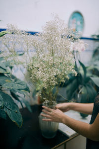 Close-up of hand with flowers