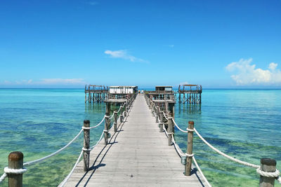 Pier over sea against sky