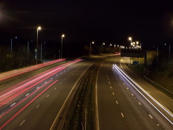 Light trails on road at night