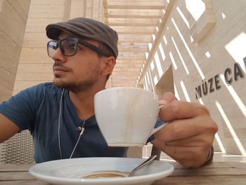 Man having coffee at cafe