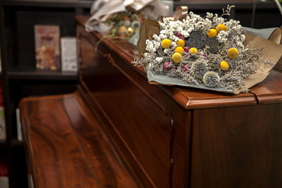 Dried flowers on piano at home