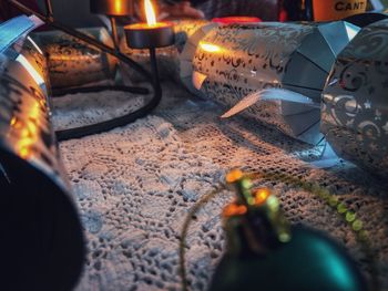 Close-up of candles on table