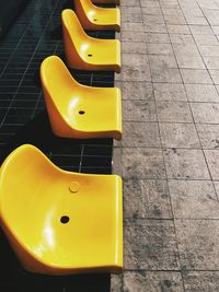 High angle view of yellow seats