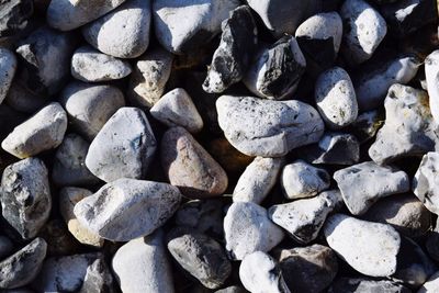 Full frame shot of pebbles on beach