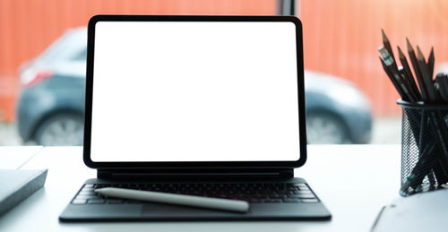 Close-up of laptop on table