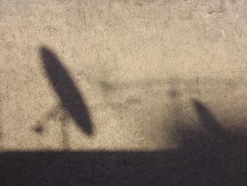 Close-up of shadow on sand