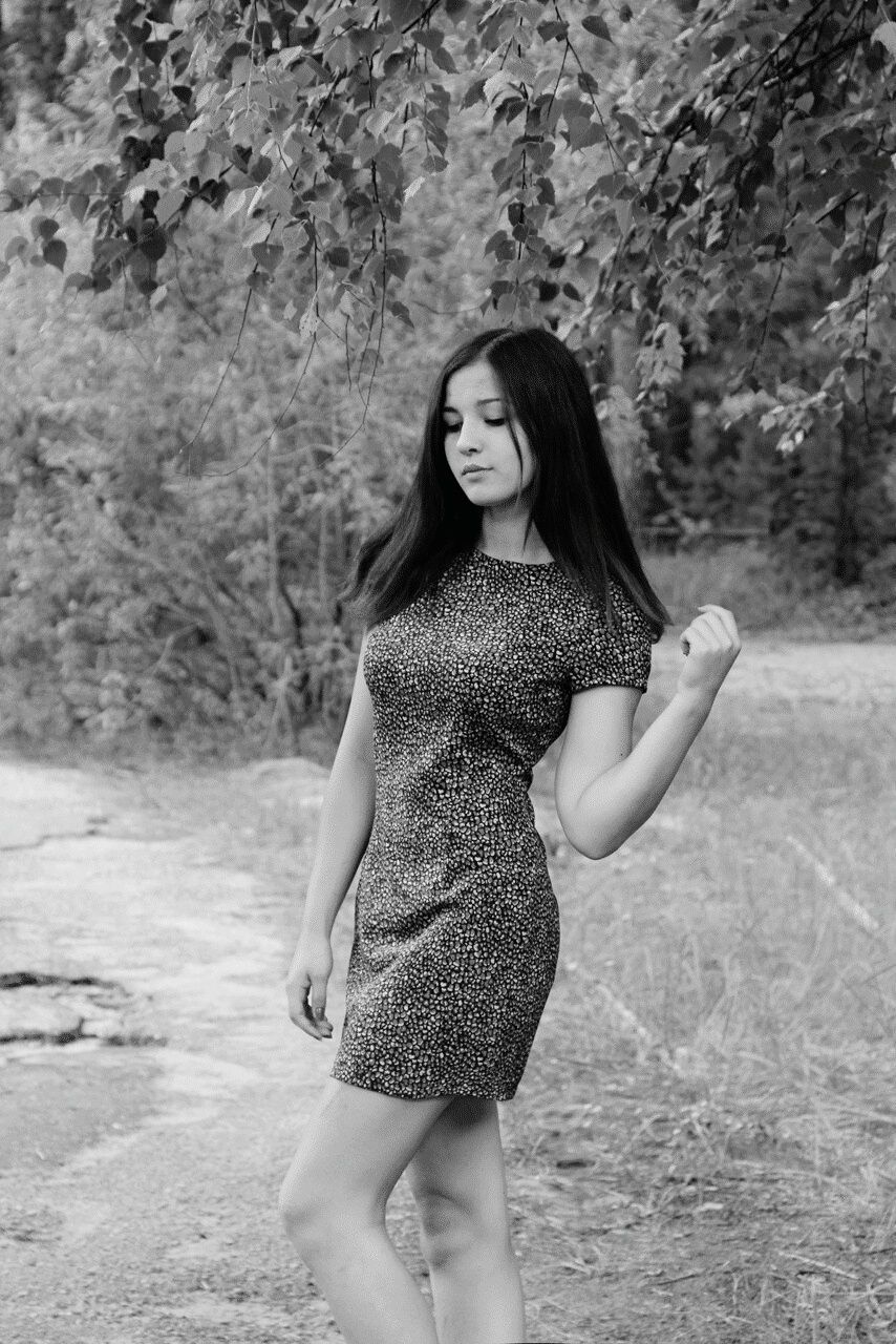 young adult, young women, person, lifestyles, long hair, leisure activity, casual clothing, beauty, standing, portrait, three quarter length, front view, looking at camera, sensuality, full length, dress, black hair