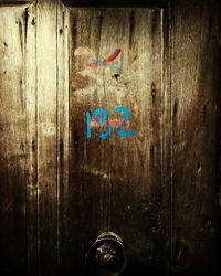 Close-up of text on wood