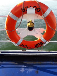 Close-up of coin-operated binoculars on water