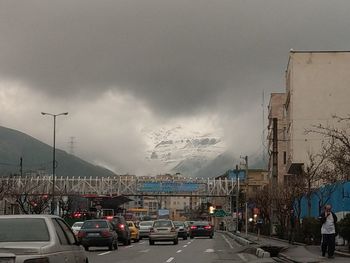 Cars on road against sky