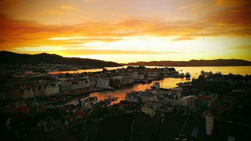 High angle view of city during sunset