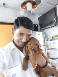 Portrait of young woman with dog