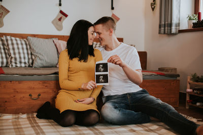 Couple sitting at home